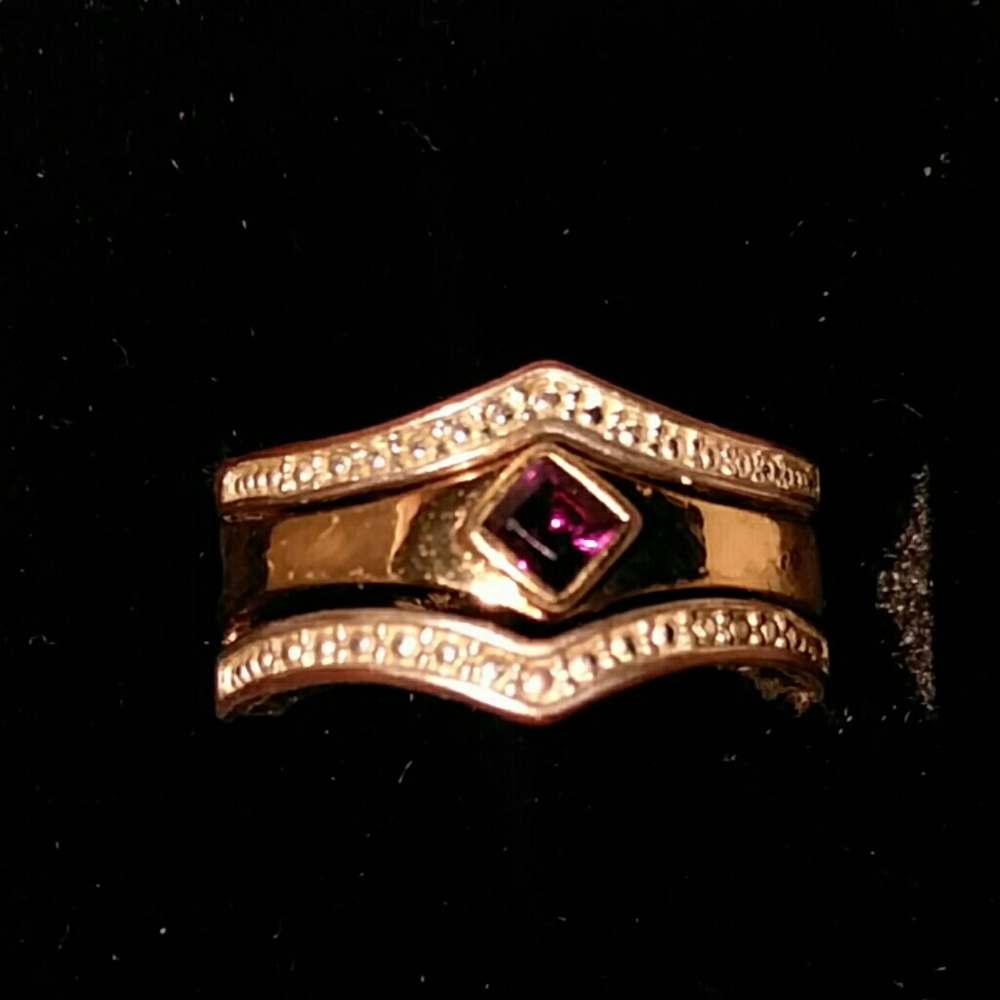 Purple stone, gold ring